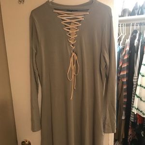 Lace up, long sleeve dress.